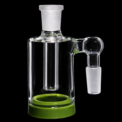 Close-up front view of the Smoke Cartel 4-inch Silicone Base Reclaim Ash Catcher - 90 degree - 14mm showing clear glass joints, a green silicone base, and a black background.