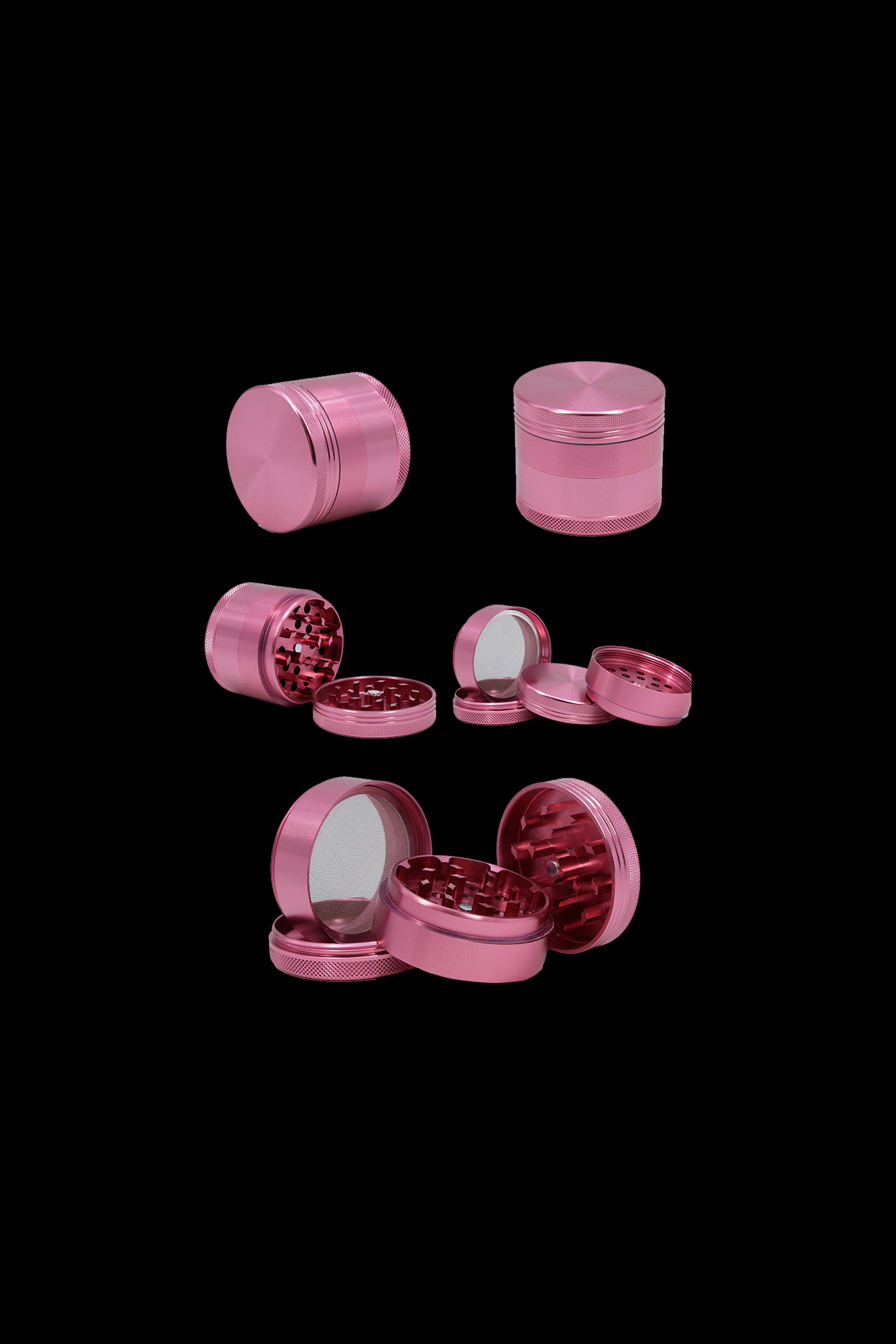 Pink metal cannabis grinder components displayed against a black background.