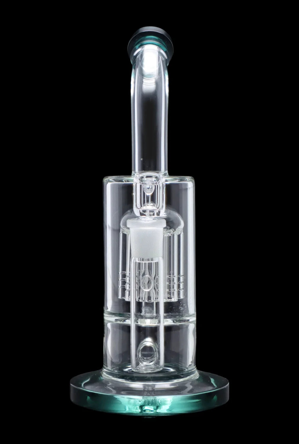 Clear glass dab rig with intricate percolator design, isolated on black.