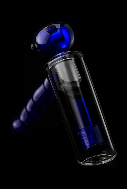 Blue glass oil rig with intricate curves against a black background.