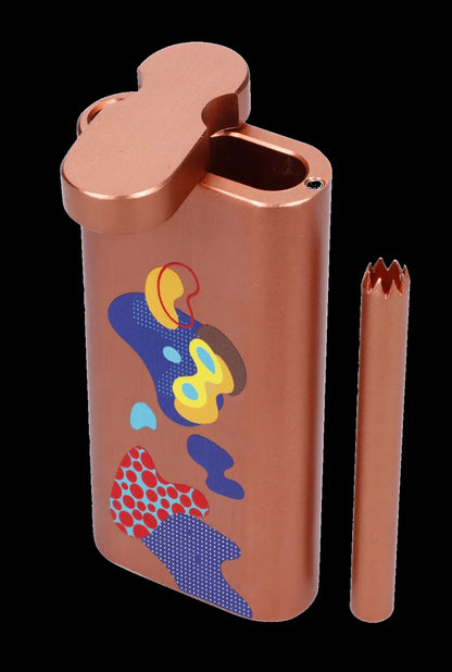 Orange one-hitter pipe with colorful pop art design and metal cleaning pick.