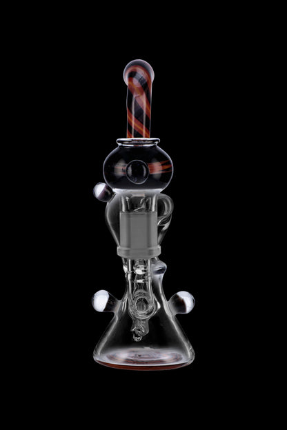 Glass water pipe (bong) with red accents, isolated on a black background.