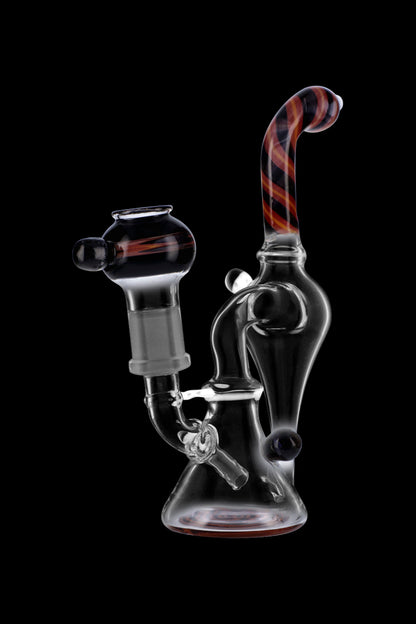 Glass water pipe (bong) with colorful accents, isolated on a black background.
