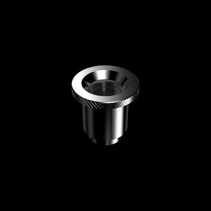 Close-up top view of the metallic Boost Evo™ Quartz Atomizer showing a knurled rim and reflective inner chamber against a black background.