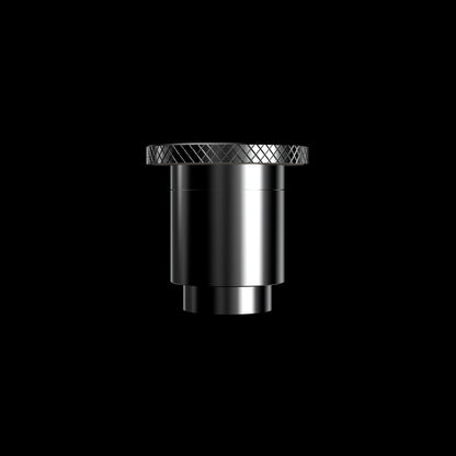 Close-up front view of the chrome knurled top of the Boost Evo™ Quartz Atomizer against a black background.