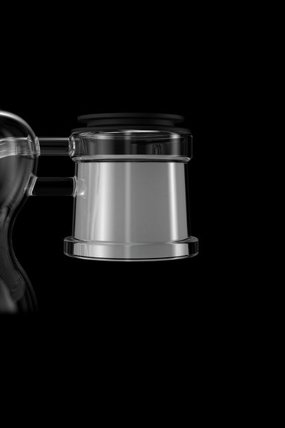 Clear glass cannabis bubbler with black accents, isolated on a black background.