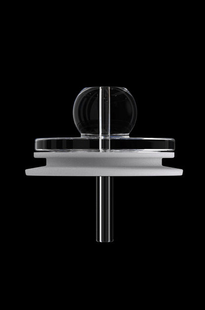 Clear quartz cannabis dab rig nail with black accents, isolated on a black background.