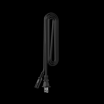 Top-down view of a coiled black Switch™ Charging Cable and Adapter against a solid black background.