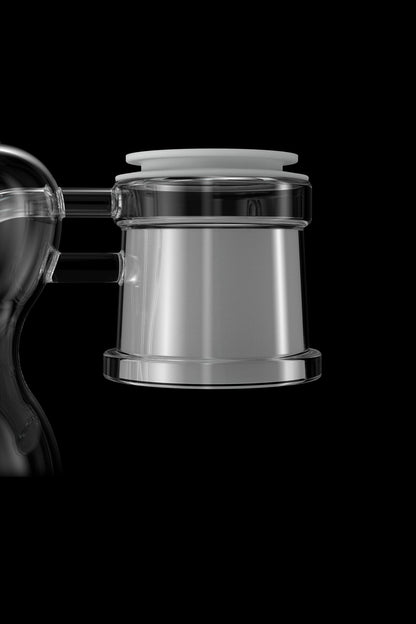 Clear glass cannabis water pipe bubbler with a frosted rim, isolated on a black background.