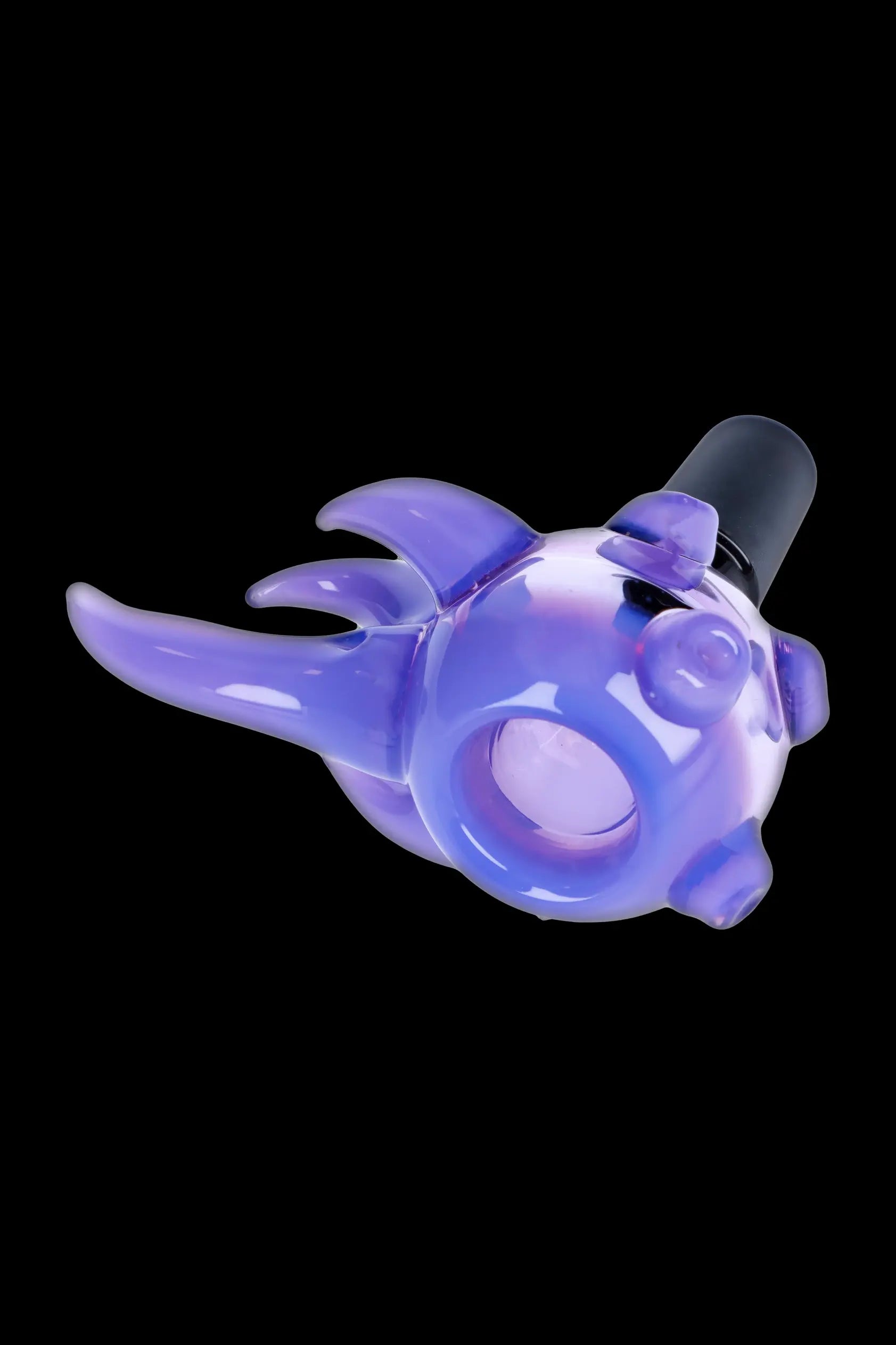 Purple glass octopus-shaped smoking piece against a black background.