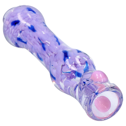 Angled close-up of the Smoke Cartel Frit Cone One Hitter - 3 in., showing its purple and blue frit pattern under glossy clear glass with a pink-tipped mouthpiece