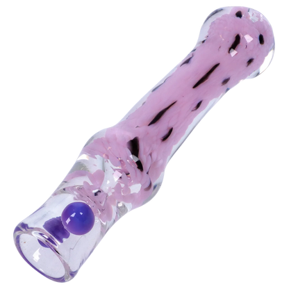 Diagonal close-up of a translucent Smoke Cartel Frit Cone One Hitter - 3 in. showing pink internal frit streaks and a small purple glass dot.