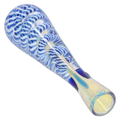 Angled close-up of the Smoke Cartel Piped and Fumed One Hitter - 3 in., showing its blue-and-white swirled fuming pattern along the rounded mouthpiece.