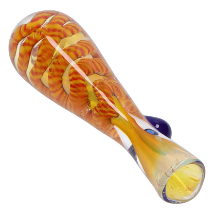 Angled close-up of the Smoke Cartel Piped and Fumed One Hitter - 3 in., showing a glossy yellow-orange twisted fume pattern and rounded mouthpiece.