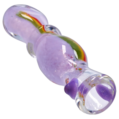 Angled close-up of the Smoke Cartel Frit Rasta One Hitter - 3 in., showing a lavender glass body with embedded green-yellow-red stripe and clear rounded mouthpiece.