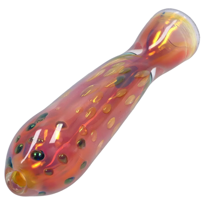 Angled close-up of the iridescent Smoke Cartel Gold Dot One Hitter - 3 in. showing a red-orange glass body with raised gold dots and reflective highlights