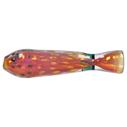 Side-on view of the iridescent, pink-orange Smoke Cartel Gold Dot One Hitter - 3 in. showing raised gold dots and a tapered mouthpiece.