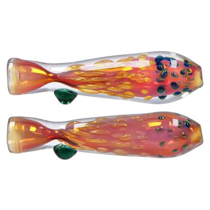 Side view of the Smoke Cartel Gold Dot One Hitter - 3 in. showing two identical iridescent glass tubes with orange-red internal swirls and raised green and blue dot accents.
