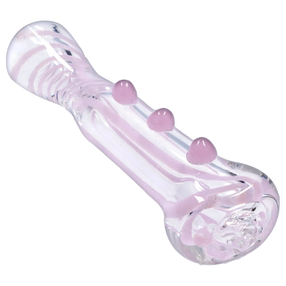 Angled close-up of the Smoke Cartel Slime Line One Hitter - 3 in., showing its clear glass body with pale pink swirls and three raised pink glass knobs.
