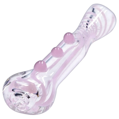 Angled close-up of the Smoke Cartel Slime Line One Hitter - 3 in., showing its clear glass body with pale pink swirl stripes and three raised pink knobs.