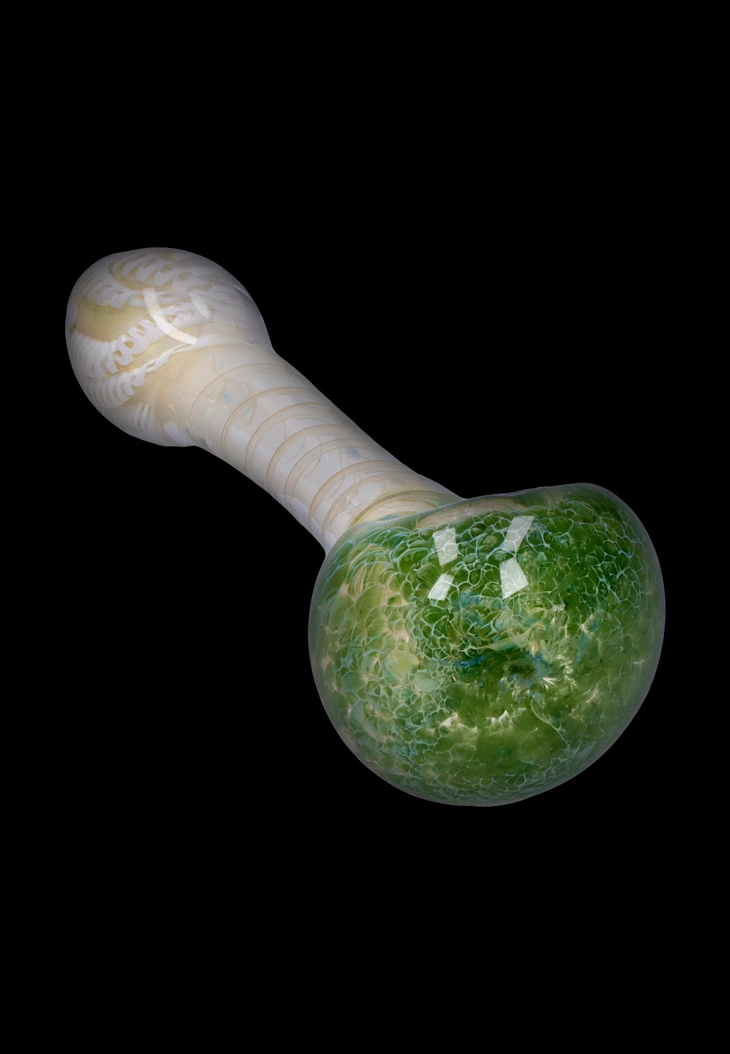Angled close-up of the Smoke Cartel Twisting Frit Spoon Pipe - 3 in. showing a glossy green fritted bowl and pearlescent twisted white stem on black.