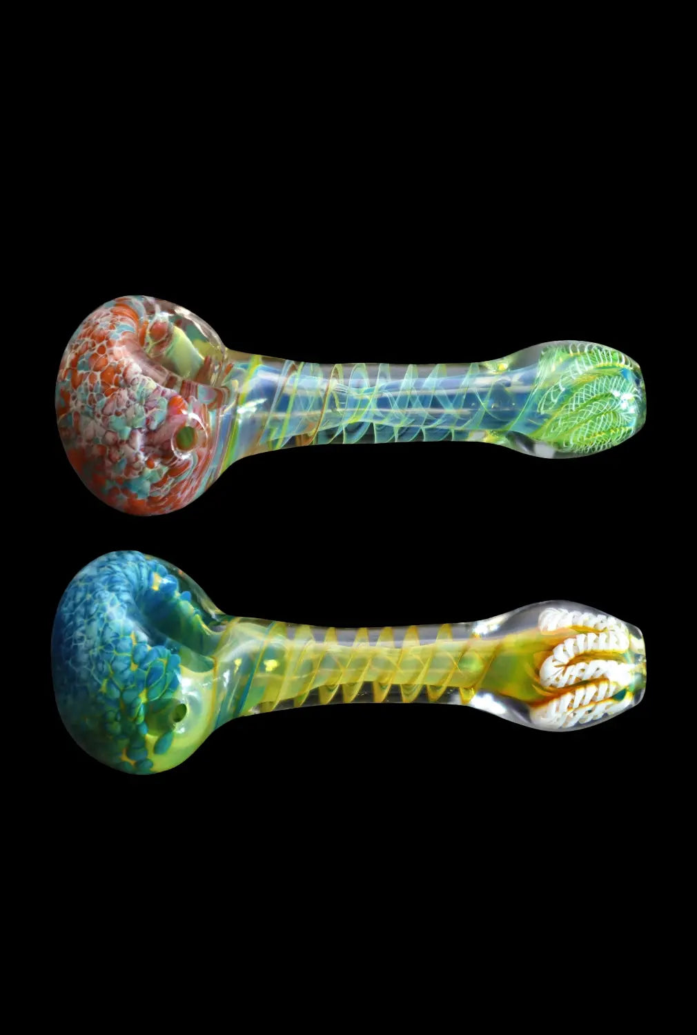 Side view of two colorful Smoke Cartel Twisting Frit Spoon Pipe - 3 in. hand pipes on a black background, showing twisted internal frit patterns.