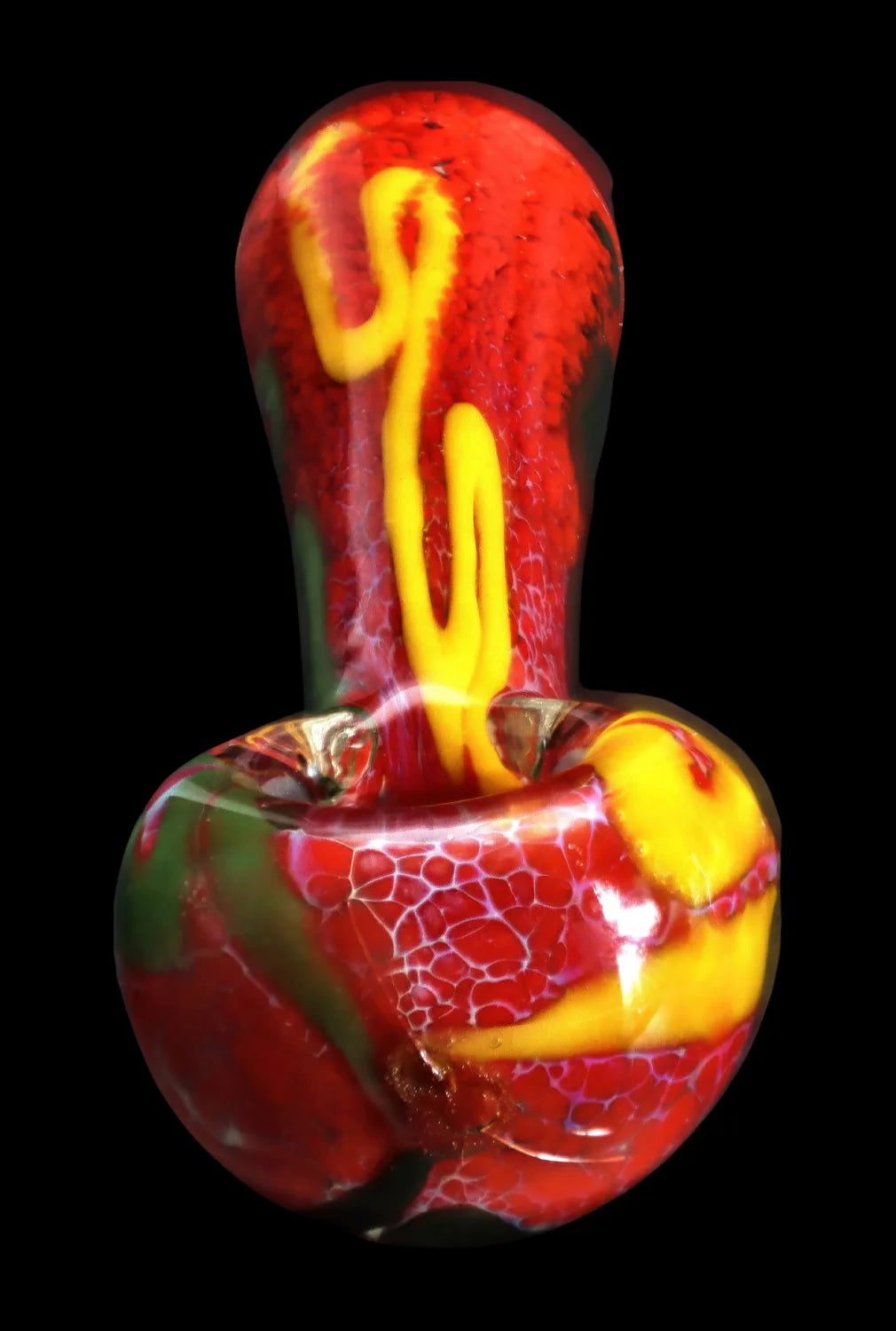 Close-up front view of the Smoke Cartel Color Frit Spoon Pipe - 3 in. showing red glass with yellow squiggle accents and a textured, crackled surface against black background