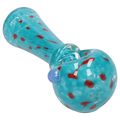 Angled close-up of the Smoke Cartel Frit with Twisted Mouthpiece Spoon Pipe - 4 in., showing its turquoise glass body with red frit speckles and a blue glass bump.