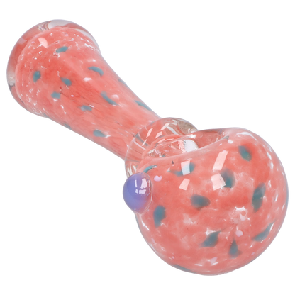 Angled close-up of the pink, speckled Smoke Cartel Frit with Twisted Mouthpiece Spoon Pipe - 4 in., showing its rounded bowl, blue dot accents, and glossy finish