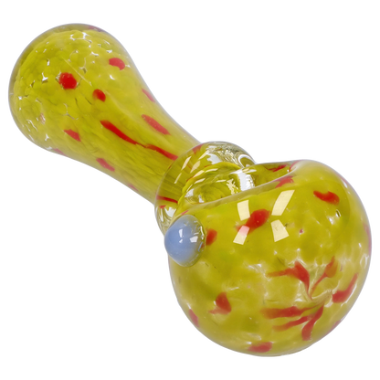 Angled close-up of the Smoke Cartel Frit with Twisted Mouthpiece Spoon Pipe - 4 in. showing its yellow glass body with red frit accents and a blue glass carb.