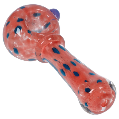 Angled close-up of the Smoke Cartel Frit with Twisted Mouthpiece Spoon Pipe - 4 in., showing a milky pink glass body with blue spots.