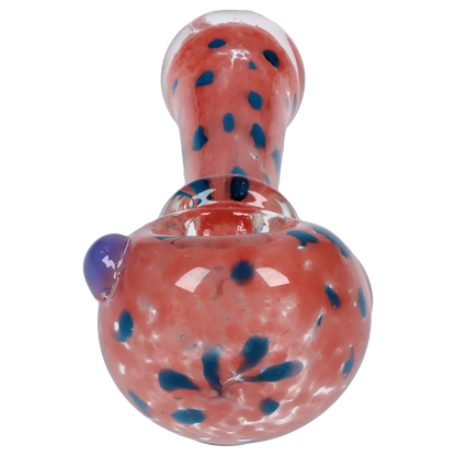 Close-up front view of the Smoke Cartel Frit with Twisted Mouthpiece Spoon Pipe - 4 in. showing a pink glass body with scattered blue frit dots and a rounded bowl.