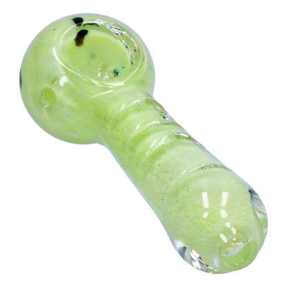 Angled close-up of the Smoke Cartel Frit Marble Rim Pastel Spoon Pipe - 3.5 in. showing a glossy pale green bowl and ridged stem with subtle frit speckles.
