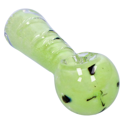 Angled close-up of the Smoke Cartel Frit Marble Rim Pastel Spoon Pipe - 3.5 in. showing its glossy pale green body, ribbed neck, and dark frit spots.