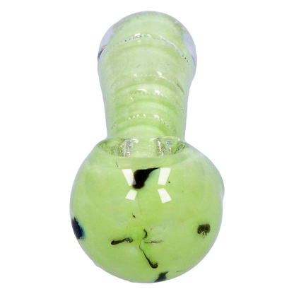 Top-down close-up of the Smoke Cartel Frit Marble Rim Pastel Spoon Pipe - 3.5 in., showing its pale green glass bowl, rounded mouthpiece and scattered dark frit accents.