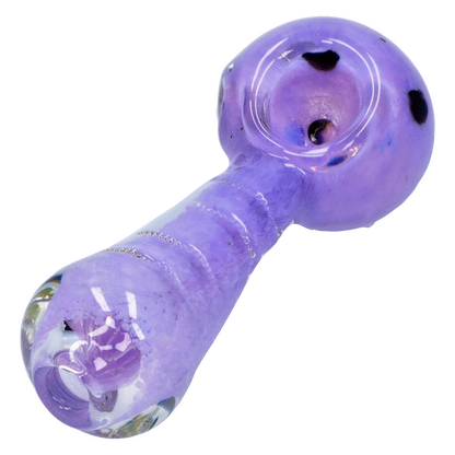 Close-up angled view of the Smoke Cartel Frit Marble Rim Pastel Spoon Pipe - 3.5 in., showing its matte lavender body, glossy rounded bowl with black frit accents, and reflective highlights.