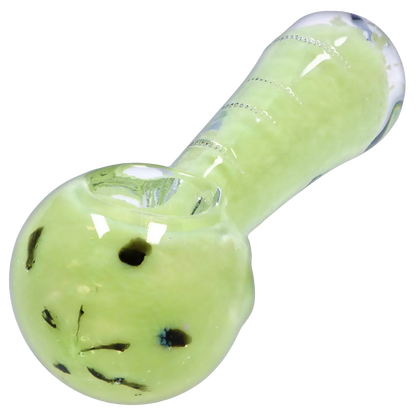 Angled close-up of the pale green Smoke Cartel Frit Marble Rim Pastel Spoon Pipe - 3.5 in., showing glossy glass and dark frit dots.
