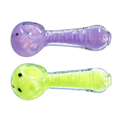 Top-down view of two frit glass spoon pipes, the Smoke Cartel Frit Marble Rim Pastel Spoon Pipe - 3.5 in. in purple above a lime green variant, both on a white background.