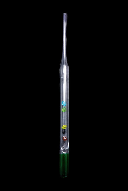 A straight-on view of the SC Glass Straw with Beads, showcasing the clear glass tube with colorful beads inside.