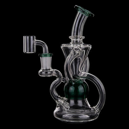 Angled close-up of the Smoke Cartel Color Tube Recycler Dab Rig - 5.2 in. showing clear glass tubing, green accents, and a black background