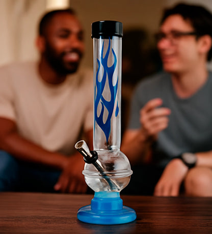 Close-up front view of the JM Plastics Flame Bubble Base with Ring and Carb Hole Acrylic Bong showing blue flame decals on its clear tube and blue base.