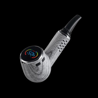 Angled close-up of the Cipher Nautilus V3 Dry Herb Vaporizer | Birch Wood showing its curved birch-grain body and illuminated circular OLED display.
