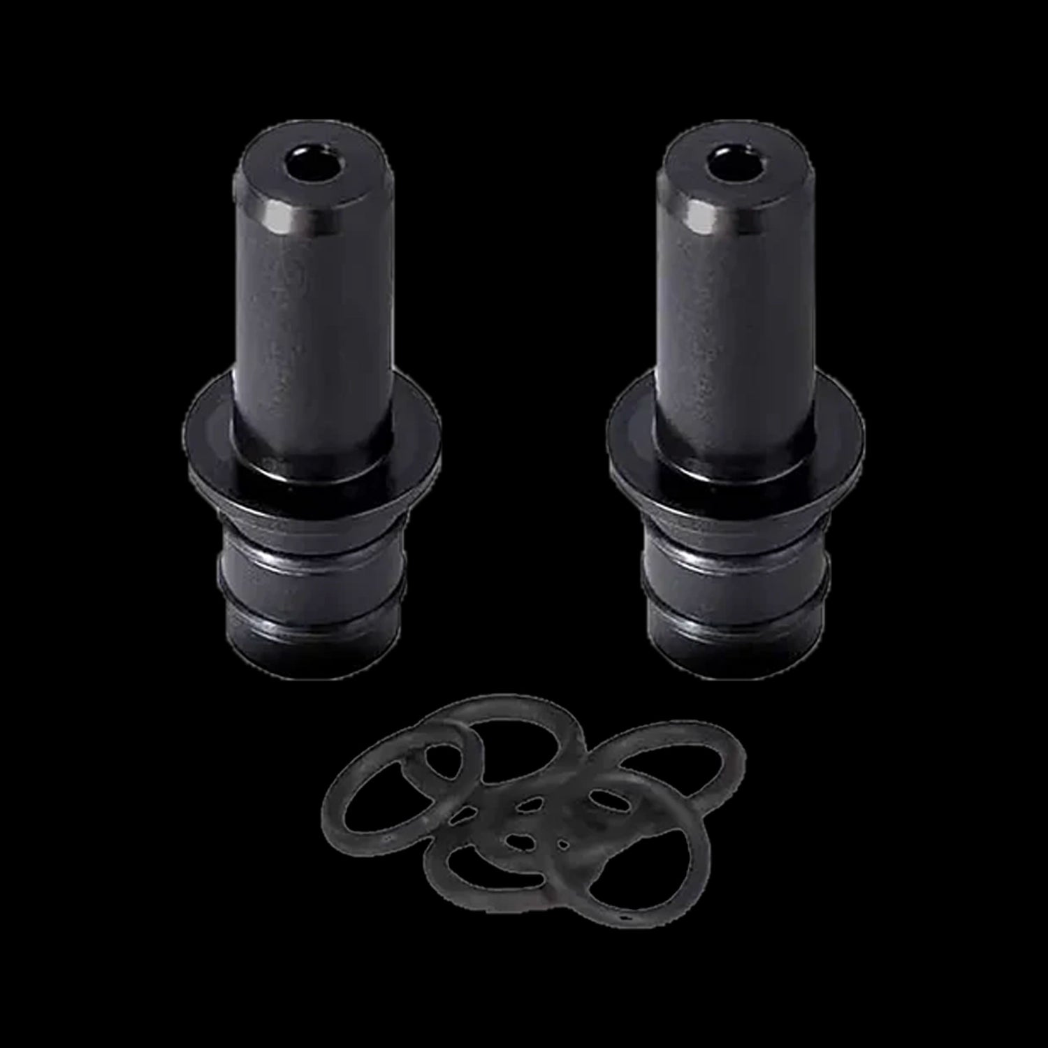 Top-down view of two black Cipher NOVA Hookah Mouthpiece Adapter - 2pc cylinders with matching round rubber rings on a black background
