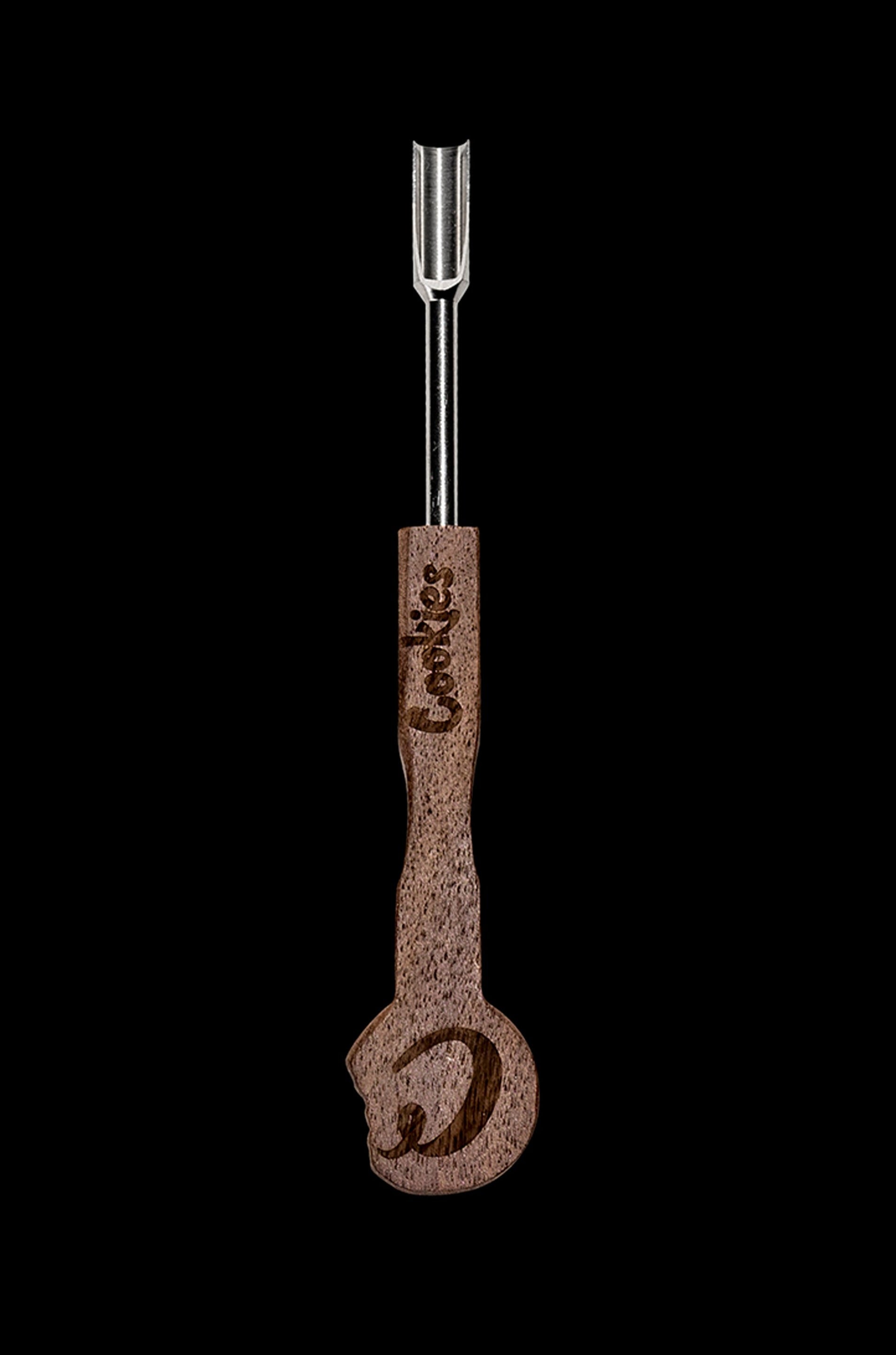 Wooden cannabis dab tool with stainless steel tip, branded “Cookies”.