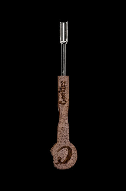 Wooden cannabis dab tool with silver tip and “Cookies” branding.