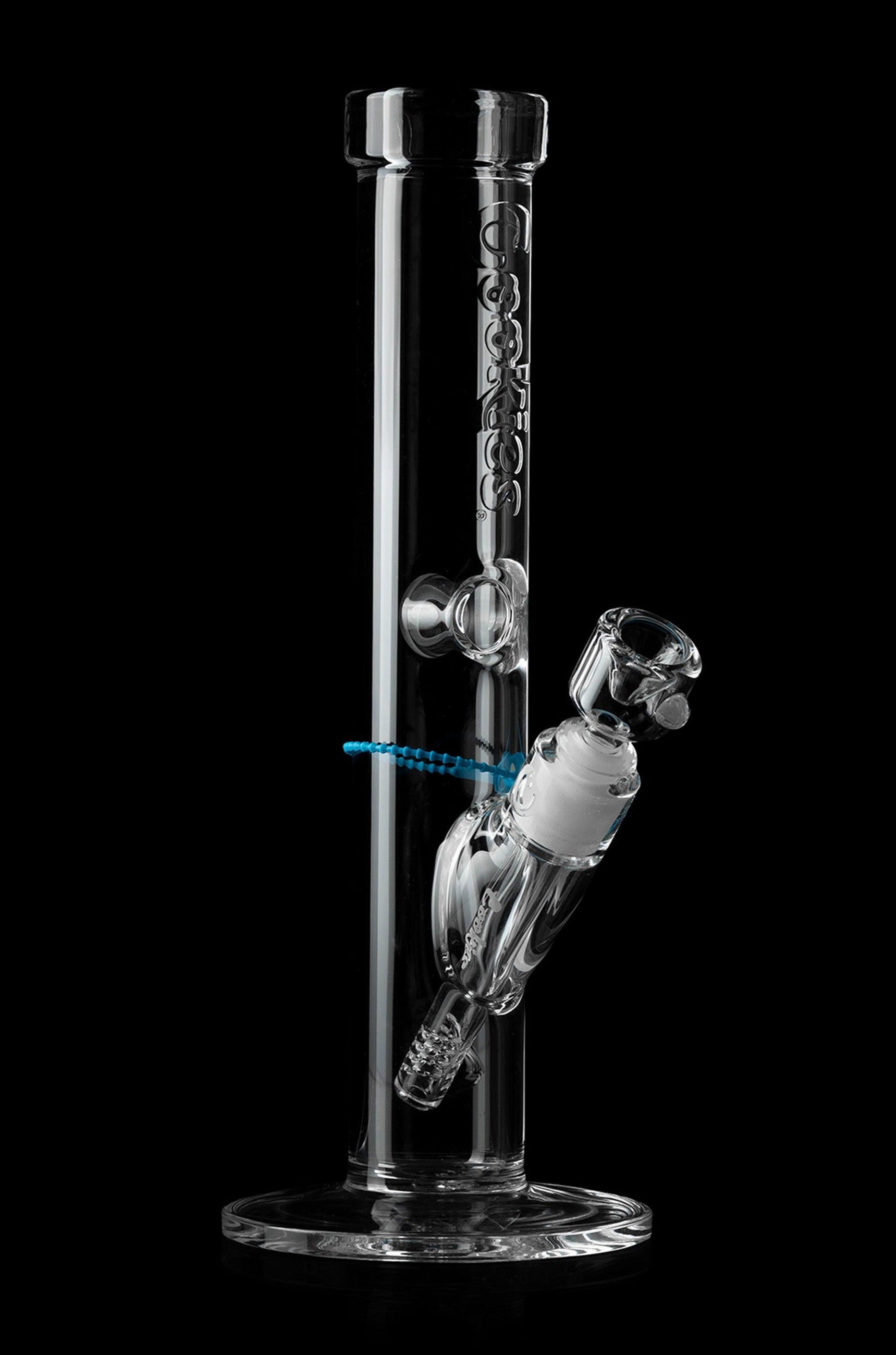 Clear glass water pipe (bong) with intricate percolator design, isolated on black.