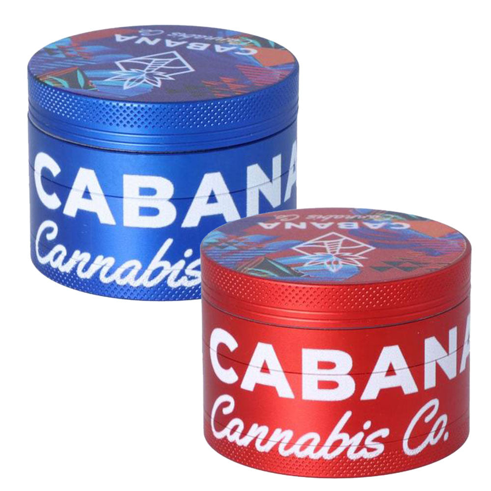 Front view of the Cabana Cannabis Co. 3 Stage Grinder - The Dawn, showcasing a metallic blue grinder with branded detailing.