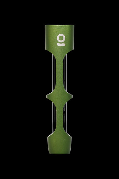 Green cannabis oil applicator with a white logo against a black background.