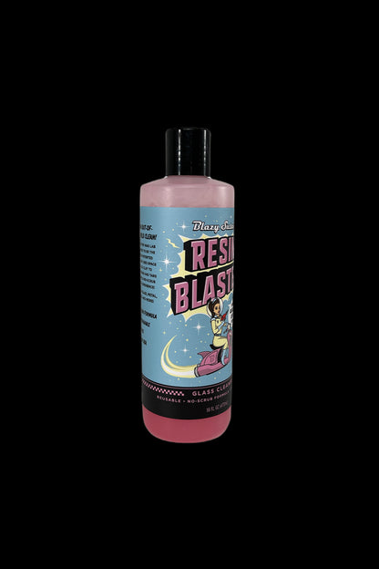 A bottle of “Resin Blast” glass cleaner with a retro design featuring a woman smoking a pipe.