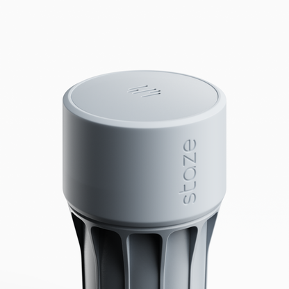 Close-up angled view of the cylindrical top and vent slots of the STAZE PRESERVE against a bright white background.